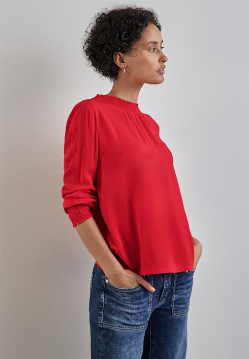bluse-mit-smock-details-mandarin-red