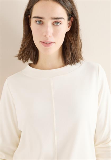 creamy white