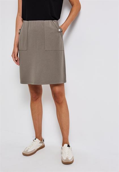 Rock in Unifarbe dark tumbled beige