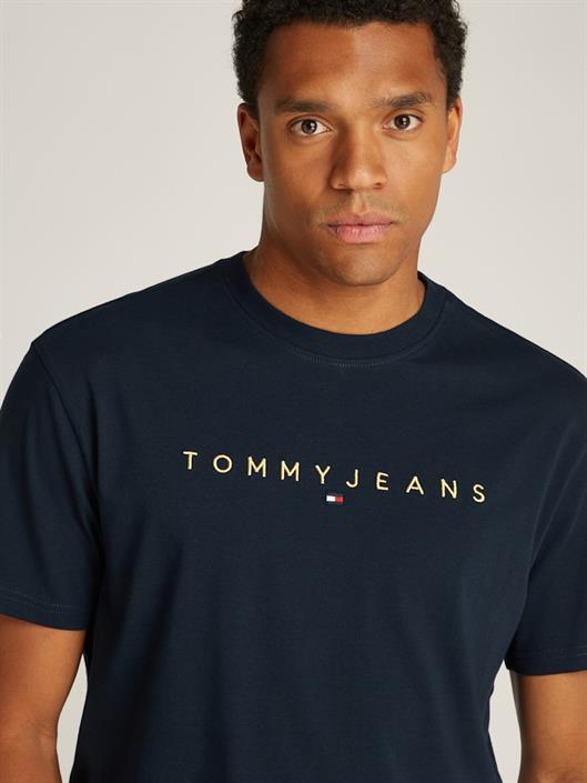 tjm-reg-gold-linear-logo-tee-ext-dark-night-navy