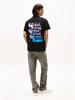 TJM REG STACK BACKPRINT TEE EXT black